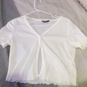 a white cropped shirt